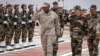 FILE - Moroccan and AFRICOM commanders review an honor guard during an exercise in Morocco, May 31, 2024. AFRICOM’s deputy legal counsel, retired Col. Max Maxwell, says it is critical to ensure the rule of law is followed when troops are deployed.