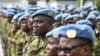 FILE - Members of the U.N. Multidimensional Integrated Stabilization Mission in Mali (MINUSMA) stand during a ceremony at Camp Gallieni in Abidjan, Jan. 24, 2023.