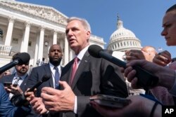 House Speaker Kevin McCarthy speaks to reporters about the debt limit negotiations, May 25, 2023, on Capitol Hill in Washington.