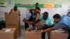 Dominicans await results of general elections with eyes on crisis in neighboring Haiti 