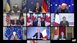 2022年10月11日，七大工业国组织领导人同乌克兰总统泽连斯基举行视频会议，乌克兰总统泽连斯基（左上角）与日本首相岸田文雄（右下角）同框出现在视频会议银幕上。