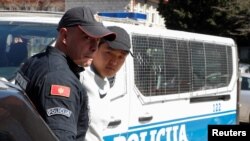 Južnokorejski državljanin Do Kvon stiže u sud u Podgorici, mart 2023. (Foto: REUTERS/Stevo Vasiljevic)