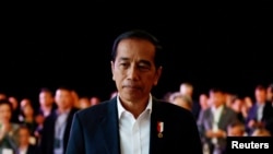 Presiden Joko Widodo berbicara tentang rencana ibu kota baru Nusantara, pada Ecosperity Week di Singapura, 7 Juni 2023. (REUTERS/Edgar Su)