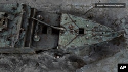 This grab taken from a digital scan released by Atlantic/Magellan May 18, 2023, shows a view of the bow of the Titanic, in the Atlantic Ocean, created using deep-sea mapping.