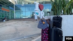 Bags sit in front of Luis Munoz Marin International Airport in Carolina, Puerto Rico. (Salome Ramirez/VOA)
