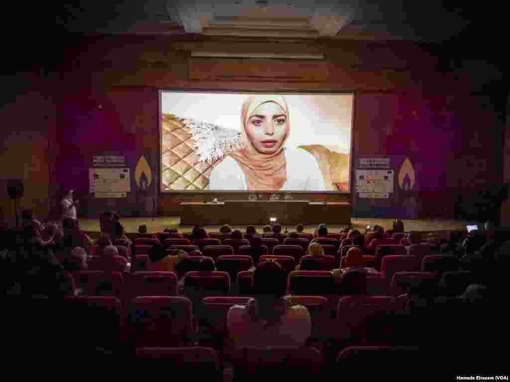 A video message from Gazan filmmaker Reema Mahmoud plays at Masharawi’s AIWFF talk “Resistance Cinema.” Reema is one of 22 besieged Gazan storytellers who are part of “Ground Zero,” Masharawi’s new funding initiative. Aswan, Egypt, April 23, 2024.