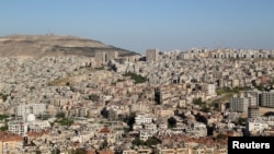 FILE - A view of Damascus, Syria, April 22, 2021. 