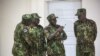 Members of a U.N.-backed force led by Kenya stand at police headquarters ahead of a press conference in Port-au-Prince, Haiti, July 8, 2024.