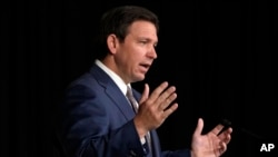 FILE - Florida Governor Ron DeSantis speaks in West Palm Beach, Florida, Feb. 15, 2023. DeSantis signed into law one of the toughest abortion bans in the United States on Thursday