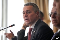 FILE - Switzerland's Foreign Minister Ignazio Cassis speaks during a visit in Manila, Philippines, Feb. 8, 2024.