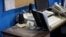 An empty spot on reporter Phyllis Zorn's desk shows where the tower for her computer sat before law enforcement officers seized it in a raid on the Marion County Record, Aug. 13, 2023, in Marion County, Kansas. 