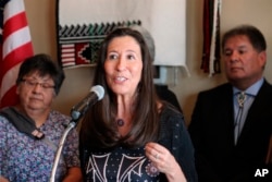 FILE - U.S. Rep. Teresa Leger Fernández answering questions following a roundtable discussion, Sept. 26, 2022, in Albuquerque, New Mexico.