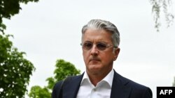 Rupert Stadler, mantan CEO mobil Jerman Audi, tiba di pengadilan regional di Munich, Jerman selatan, 27 Juni 2023. (Christof STACHE / AFP)