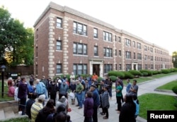 FILE -- Tenants gather to battle proposed rent increases in Malden, Massachusetts, currently the most expensive state to rent an apartment in.