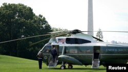 President Joe Biden boards Marine One on the South Lawn of the White House in Washington, Aug. 15, 2023.