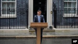 Britain's Prime Minister Rishi Sunak speaks to the media outside 10 Downing Street in London, May 22, 2024.