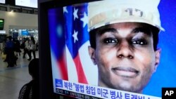 A TV screen shows a file image of American soldier Travis King during a news program at the Seoul Railway Station in Seoul, South Korea, Sept. 27, 2023. North Korea said Wednesday that it will expel King who crossed the border between the Koreas in July.