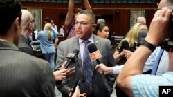 Arizona House Minority Leader Lupe Contreras, D-Cashion, answers a question after a vote on the proposed repeal of Arizona's near-total ban on abortions won approval from the House, April 24, 2024, in Phoenix.
