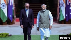 Australian Prime Minister Anthony Albanese and his Indian counterpart Narendra Modi arrive to attend a photo opportunity ahead of their meeting at Hyderabad House in New Delhi, India, March 10, 2023.