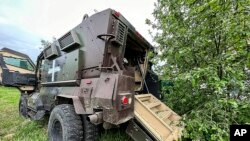 In this handout photo released by Belgorod region Governor Vyacheslav Gladkov's Telegram channel on May 23, 2023, a damaged armored military vehicle is seen after fighting in Russia's western Belgorod region.