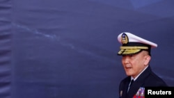FILE - Taiwan Navy Commander Tang Hua attends a ceremony of six Tuo Chiang-class corvettes in Yilan, Taiwan, March 26, 2024. During a trip to Washington this week, Hua said Taiwan wants more cooperation with the U.S. and other countries amid military pressure from China.