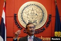 FILE - Thailand's Foreign Minister Don Pramudwinai gestures during a news conference at the Ministry of Foreign Affairs in Bangkok, Thailand, July 1, 2016.