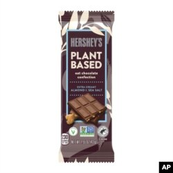 This image provided by The Hershey Company shows the company's new Hershey’s plant-based extra creamy with almonds and sea salt. The candy will be go on sale in April.