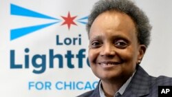 Chicago mayor Lori Lightfoot smiles as she listens during Women for Lori Rally in Chicago, Feb. 25, 2023. 