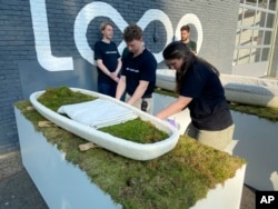 Dutch startup Loop Biotech displays cocoon-like coffins, grown from local mushrooms and up-cycled hemp fibres, designed to dissolve into the environment amid growing demand for more sustainable burial practices, in Delft, Netherlands, May 22, 2023.