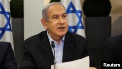 FILE - Israeli Prime Minister Benjamin Netanyahu speaks during the weekly cabinet meeting at the Defense Ministry in Tel Aviv, Jan. 7, 2024.