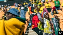 African National Congress supporters wait for South African President Cyril Ramaphosa at FNB stadium in Johannesburg, South Africa, May 25, 2024, the general election is May 29.