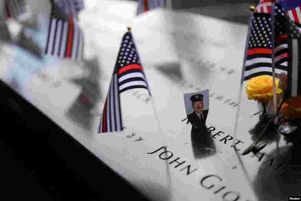 A picture is placed on the National September 11 Memorial & Museum, on the 22nd anniversary of the September 11, 2001 attacks on the World Trade Center, in New York City.