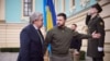This handout picture taken and released by Ukrainian Presidential press service on March 8, 2023 shows Ukrainian President Volodymyr Zelensky (R) welcoming Secretary-General of the United Nations António Guterres (L) prior to their meeting in Kyiv.