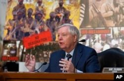 Senator Lindsey Graham, R-S.C., questions Attorney General Merrick Garland as the Senate Judiciary Committee examines the Department of Justice, at the Capitol in Washington, March 1, 2023.
