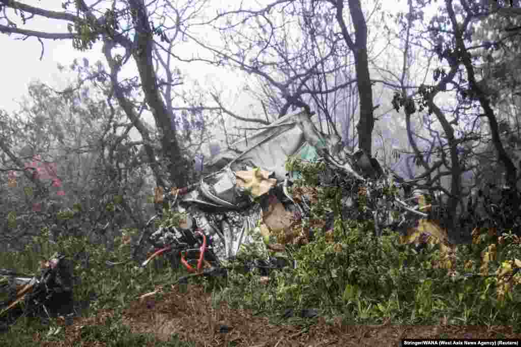A view of the wreckage of Iranian president Ebrahim Raisi's helicopter at the crash site on a mountain in Varzaghan area, northwestern Iran, May 20, 2024. 