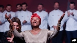 Georgiana Viou celebrates her star during the 2023 Michelin Guide ceremony in Strasbourg, eastern France, Monday, March 6, 2023. (AP Photo/Jean-Francois Badias)