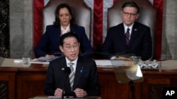 Japan's Prime Minister Fumio Kishida addresses a joint meeting of Congress in the House chamber, April 11, 2024, at the Capitol in Washington, as Vice President Kamala Harris and Speaker of the House Mike Johnson look on. 