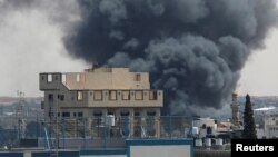 Smoke rises after an Israeli strike as Israeli forces launch a ground and air operation in the eastern part of Rafah, amid the ongoing conflict between Israel and Hamas, in Rafah, in the southern Gaza Strip, May 7, 2024.