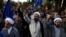 Iranian demonstrators chant slogans during an anti-Israeli gathering at the Felestin (Palestine) Square in Tehran, April 15, 2024. World leaders are urging Israel not to retaliate for Iran's weekend missile and drone attack.