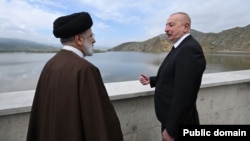  Seyid İbrahim Rəisi və İlham Əliyev.