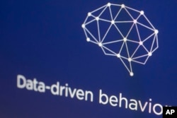 Grafik dari situs Cambridge Analytica ditampilkan di layar komputer di New York, 18 April 2018. (AP/Mark Lennihan)