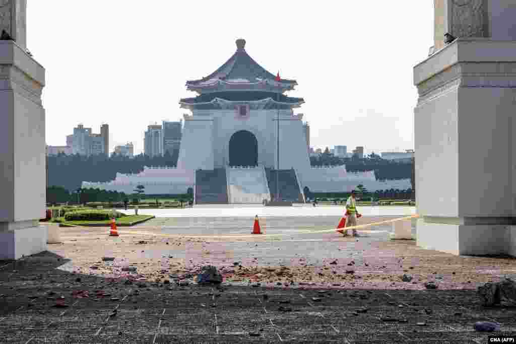 This photo taken by Taiwan&#39;s Central News Agency (CNA) on April 3, 2024 shows a barricade erected around debris in the compound of the Chiang Kai-shek Memorial Hall in Taipei after a major earthquake hit Taiwan&#39;s east.&nbsp;