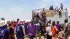 People who crossed from Sudan are seen at a refugee camp in Renk County, South Sudan, Wednesday, May 3, 2023.