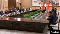 资料照：中国领导人习近平与叙利亚总统阿萨德在杭州举行会谈。(2023年9月22日)