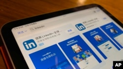 The internet App Store page showing the Chinese LinkedIn app is displayed on a device in Beijing, Oct. 15, 2021