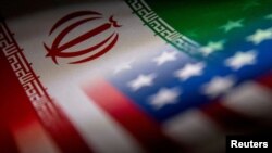 Bendera Iran dan Amerika Serikat tercetak di atas kertas dalam sebuah ilustrasi yang diambil pada 27 Januari 2022. (Foto: REUTERS/Dado Ruvic)