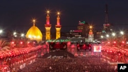 Shiite pilgrims mark the holiday of Arbaeen in Karbala, Iraq, Aug. 24, 2024.