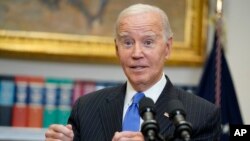 President Joe Biden responds to questions from reporters after speaking about the September jobs report in the Roosevelt Room of the White House, Oct. 6, 2023, in Washington.