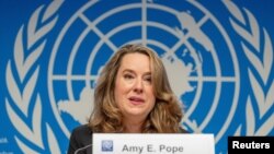 Amy Pope, the new director general of the International Organization for Migration (IOM) attends a news conference in Geneva, Switzerland, Oct. 2, 2023. 