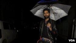 Ghulam Hassan Khan wakes people for Suhoor using a tape-recorder.